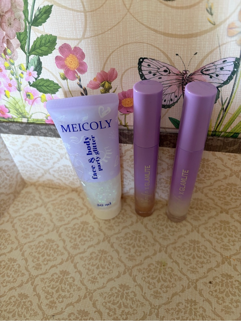 Glamlite x Mikayla 2 PC Lip Gloss Set And Meicoli Face And Body Glitter Bundle
